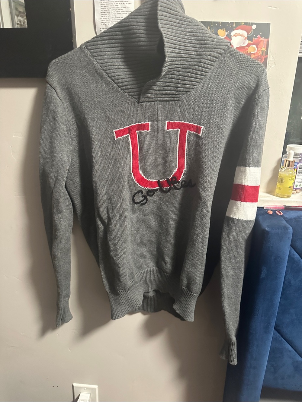 Gray Turtleneck Sweater with Red 'U' Chest Emblem